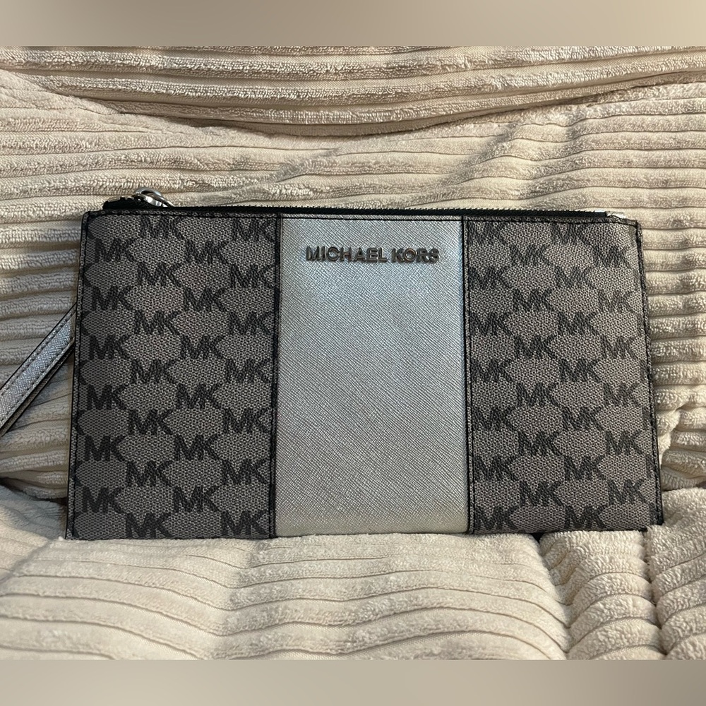 Michael Kors Gray and silver MK Zip wristlet 🥳